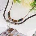 Bohemian ankere-ketting met gevlochten touw, houten kralen en zilveren blad hanger - Blad