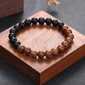 Handmade stretch bracelet with matte black onyx stones and natural wenge wood beads - Black Agate And Wood Grain