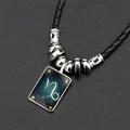 Collier signe du zodiaque Capricorne avec pendentif bleu et cordon en cuir tressé noir - Ciel Nocturne Capricorne