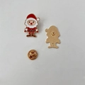 Detailed back view of a red Santa enamel pin showing textured metal and gold butterfly clutch - Santa Claus Style