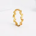 Detailed view of gold olive branch ring featuring polished leaf design and mirror finish - US 6 / Gold