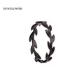 Macro detail of a black branch leaf patterned titanium steel ring for women - US 6 / Black