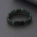 Macro detail of men's multilayer bracelet with tiger eye beads and braided leather cord - Green Textured Beads Black Braided Leather (BMB-0033-Green)
