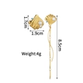 Detailed view of asymmetric gold shell earrings with white pearls and blue crystal accents - Asymmetrical Shell Pearl Tassel Style (S-E1033)