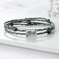 Handmade woven couple bracelet with engraved 89 and 10 silver metal charms - Gray