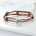 Handmade woven magnetic couple bracelet with pink and gold threads and engraved square buckle - Gold