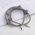 Magnetische grijze gevlochten armbanden voor koppels met sleutel en slot hangers duo - Grijs
