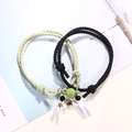 Matching magnetic braided astronaut bracelets for couples in black and mint green - Green And Black