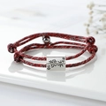 Matching magnetic red and black braided bracelets for couples with engraved metal charms - Dark Red