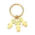Goldener Edelstahl Schlüsselanhänger mit minimalistischen Jungen und Mädchen Anhängern - Zwei Jungen Und Ein Mädchen (Goldfarbe)