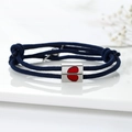 Navy blue braided couple bracelets with silver magnetic heart clasp on white surface - Navy Blue