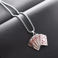 Detailed macro view of silver steel poker royal flush pendant with red enamel hearts - Red