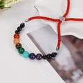 Détail du bracelet chakra en corde rouge avec neuf perles en pierres naturelles - Style Chakra Neuf Perles Corde Rouge