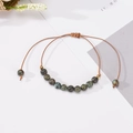 Handmade woven natural stone bead bracelet with adjustable cord and vintage aesthetic - Green Spotted Stone