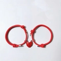 Red braided magnetic couple bracelets with heart pendants in a matching pair set - Double Red Cord With Red Heart