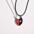 Detail of red and black magnetic heart pendants with silver chain and black cord - Wishing Stone Red Black