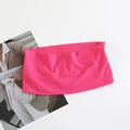 Detailed view of the neon pink elastic sports headband texture and wide band design - Rose Red