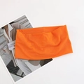 Detail of high-stretch orange sports headband with breathable textured fabric for yoga - Orange
