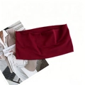 Macro view of wine red elastic sports headband with soft knit texture on white background - Burgundy