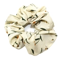 Floral print fabric scrunchie in beige with green leaves and orange flower patterns - Cream Floral