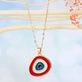 Goldene Halskette mit rotem türkischem Augen-Anhänger und minimalistischem Rahmen - Geometrisch Rot Goldkette