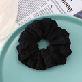 Chic black pleated hair scrunchie made of textured seersucker fabric for women - Black