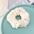 Chic cream white pleated scrunchie in bubble gauze fabric for minimalist hair styling - Off White