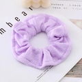Coletero de tela de toalla color lavanda con textura suave y banda elástica - Morado
