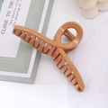 Pince à cheveux minimaliste marron caramel avec finition brillante pour coiffure femme - Orange Vif