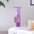 Détail d'un ensemble d'élastiques à cheveux violets dans un pot de rangement transparent - Série Violette