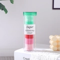 Détail d'élastiques à cheveux haute élasticité dans un flacon transparent avec bouchon - Rouge Vert Et Rose