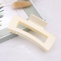 Matte cream yellow rectangular large hair claw clip for women in elegant setting - Bright White / Large