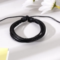 Men's handmade black woven leather bracelet featuring a nautical anchor and adjustable closure - Vintage Anchor Style (1)