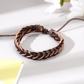 Handwoven vintage leather bracelet for men in brown featuring adjustable knot closure - Braided Leather Bracelet (1)