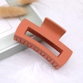 Matte caramel orange rectangular hair claw clip with a frosted finish for thick hair - Orange / Medium