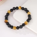 Detailed view of 8mm tiger eye, matte lava rock, and polished obsidian beaded bracelet - Yellow Tiger Eye (BNS-0155-Yellow)