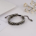 Pulsera de doble capa de piedra natural con cordón tejido ajustable y textura mineral gris - Piedra de luna