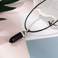 Detailed view of hexagonal black stone pendant with silver clasp on a woven cord necklace - Black Agate (NS-0019-Black Agate)