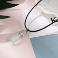 Macro view of hexagonal opal crystal pendant on black cord over aesthetic background - Opal (NS-0019-Opal)