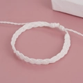 Close-up of white handmade bohemian braided cord bracelet with adjustable knot design - Solid White Style (BN-0111-6)