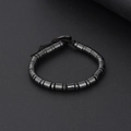 Handgefertigtes Hämatit-Perlenarmband mit schwarzer Kordel auf grauem Hintergrund - Kurzer Zylindrischer Perle Stil (BNS-0212-3)