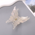 Schillernde Schmetterling-Haarklammer mit Strasskanten und cremefarbenem Perlmuttglanz - Aprikose