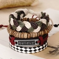Close-up of a 4-piece vintage layered bracelet set with leather and wood beads - Believe Engraved Metal Plate (BN-0129-1)