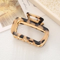 Elegant rectangular tortoiseshell hair claw clip in beige and brown acetate finish - Black Spotted