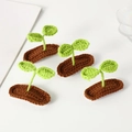 Handmade crochet green sprout hair clips set on a white background, four pieces - Sprout Hair Clip