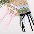 Elegant satin ribbon bow hair clips set in six assorted colors on a woven mat - Green