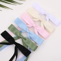 Set di sei fermagli per capelli a fiocco in vari colori con elegante texture a coste - Rosa