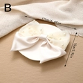 Detail view of large cream satin bow hair clip with pearls and sizing annotations - Pearl Mesh Bow (Beige)