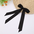 Elegant black double layer satin bow hair clip with long ribbons on white background - Black