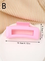 Detalle de una pinza para el pelo rectangular rosa con medidas de 10,5 cm por 4,5 cm - Rosa